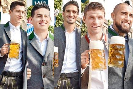 Bayern Munich footballers celebrate Oktoberfest with beer