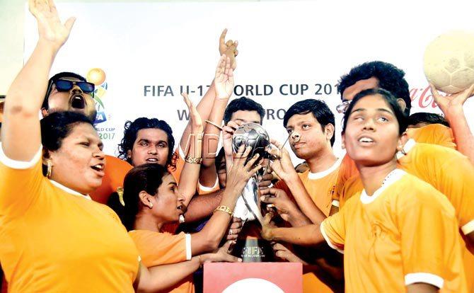 National Association for Blind football players with the FIFA U-17 World Cup at Worli yesterday. Pic/Sameer Markande