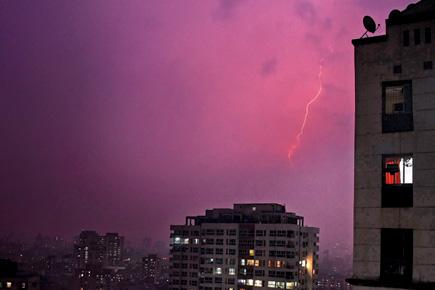 Mumbai's sky turns purple, as lightening strikes the city
