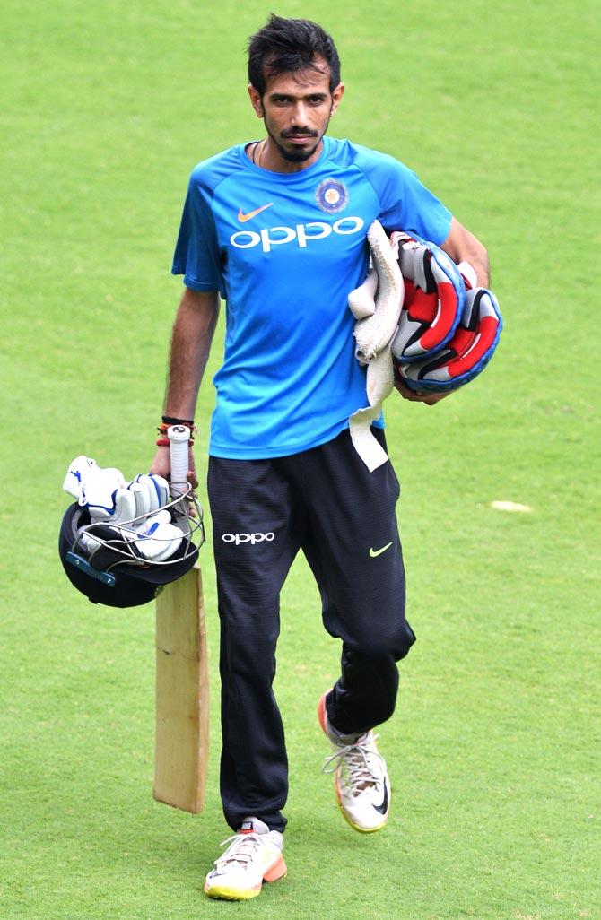 Indian cricketer Yuzvendra Chahal returns after batting in the nets during a practice session held ahead of the fourth one day international (ODI) match in the ongoing India-Australia cricket series at the M. Chinnaswamy Stadium in Bangalore on September 27, 2017. Pic/AFP