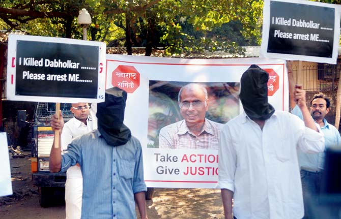 Activists at a protest against the government for not stepping up investigation in the murder of rationalist Dr Narendra Dabholakar, at Azad Maidan, in 2013