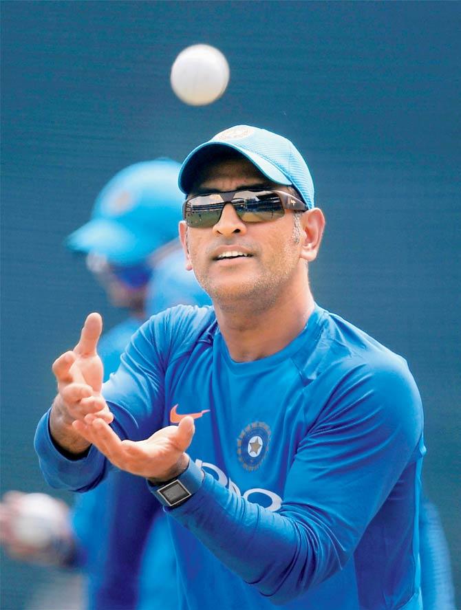 Dhoni during a practice session in Indore last week. Pic/PTI