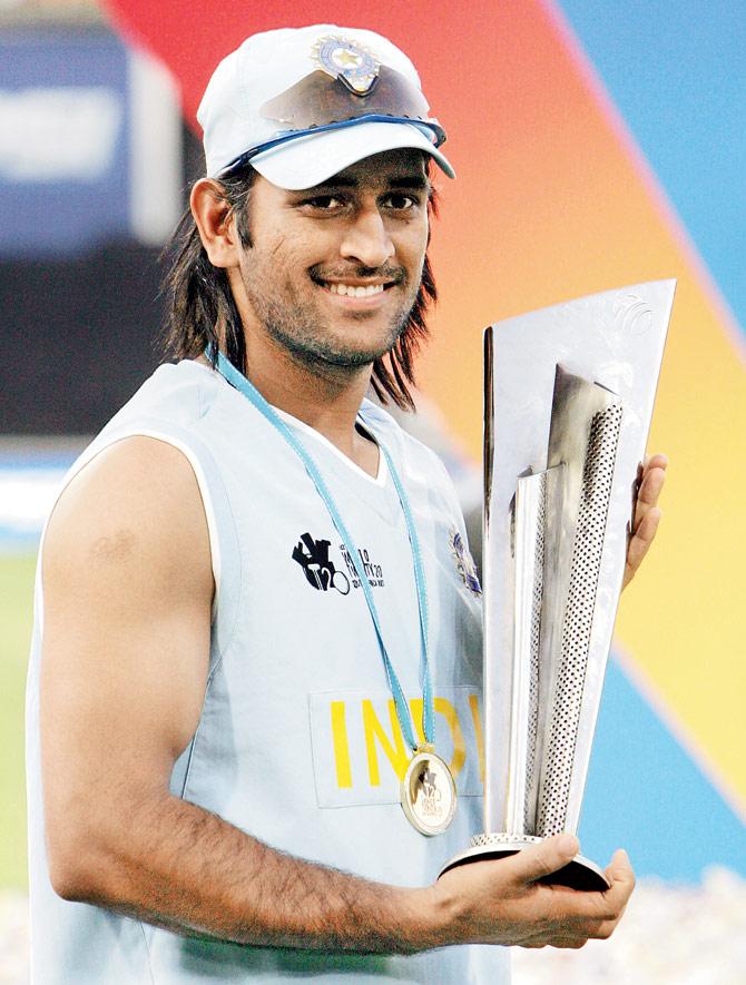 MS Dhoni with the World T20 trophy. India also won the 2011 World Cup and 2013 Champions Trophy under his captaincy