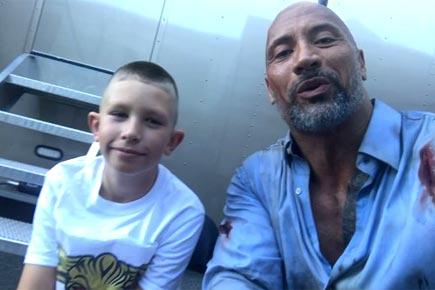 Dwayne Johnson meets boy who saved brother with 'San Andreas' move