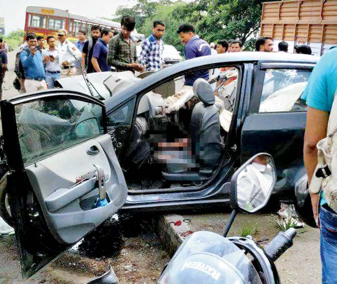 The car they were travelling in collided head-on with a Thane municipal transport bus