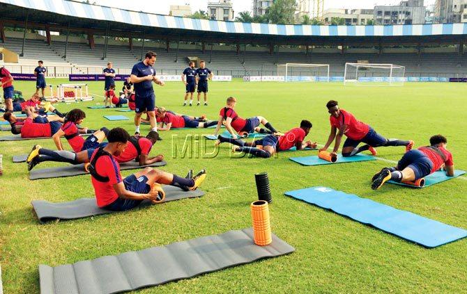 England U-17 players train at the Mumbai Football Arena, Andheri yesterday. The English boys will play a warm-up tie against NZ tomorrow. Pic/Noel D