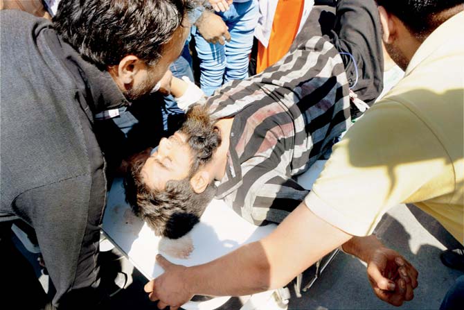 One of those injured being taken to a hospital. Pic/PTI