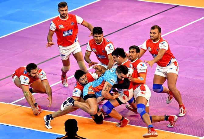 Bengal Warriors and Haryana Steelers players in action during Pro Kabaddi League match in Kolkata. Pic/PTI