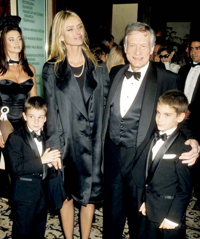 Hefner, Kimberley Conrad and sons Cooper Hefner and Marston Hefner at  Friar’s Club Gala on October 9, 1998 