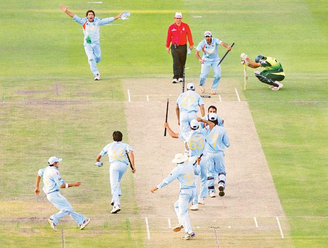 Indian players celebrate the World Twenty20 victory after claiming the wicket of Pakistan’s Misbah-ul-Haq (right) at the Wanderers in Johannesburg on September 24, 2007. With six required off four balls, Misbah mistimed his scoop shot at short fine-leg only to see the ball land in the hands of S Sreesanth. Pics/Getty Images/AFP