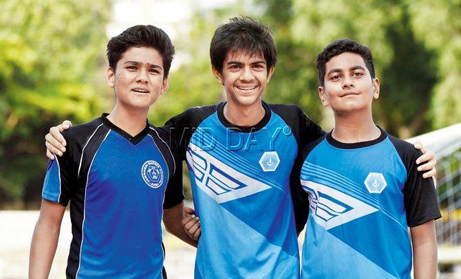 Jamnabai Narsee scorers Aryan Rawat (left), Manan Jain and Mann Sheth (right) are all smiles after their 3-0 win over Fatima High School at Azad Maidan yesterday. Pic/Shadab Khan