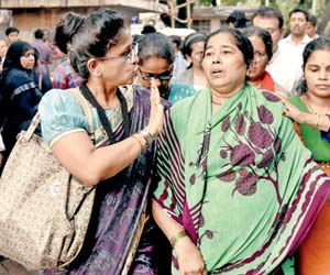 Mumbai Stampede: Grieving kin face a long wait as officials insist on autopsies