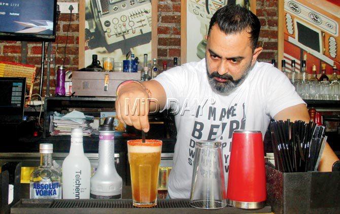 Ketan Goail Singh prepares the Lager Passion at Brewbot Eatery and Pub Brewery. Pic/Tanvi Phondekar