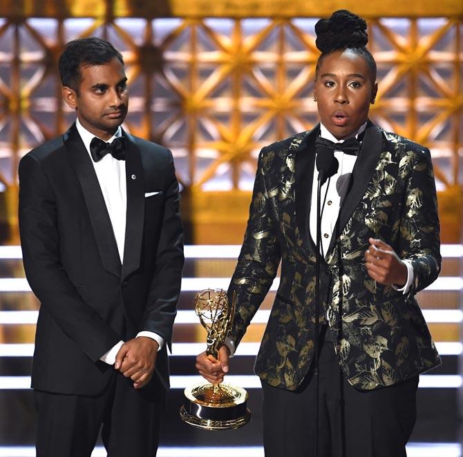 Actor/writers Aziz Ansari (L) and Lena Waithe accept Outstanding Writing for a Comedy Series for 