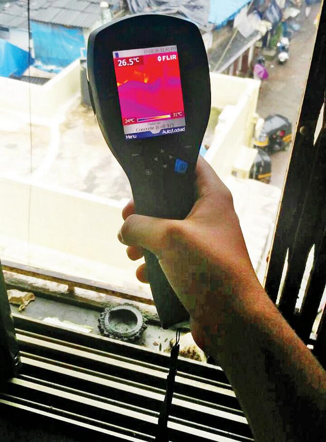 A thermal imaging scan shows leakage inside the concrete structure in Malad building