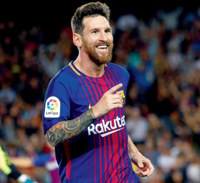 A jubilant Lionel Messi after scoring for Barcelona against Espanyol at Camp Nou on Saturday. Barcelona won 5-0. Pic/Getty Images