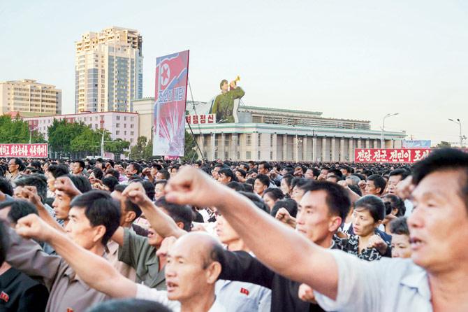 Thousands of Pyongyang residents gathered in the capital to laud  Kim Jong-Un