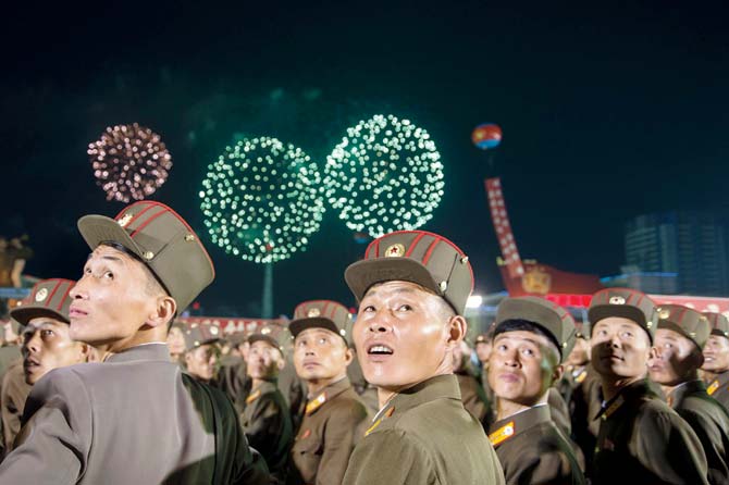 North Korean soldiers at a celebration for the latest n-test. Pic/AFP