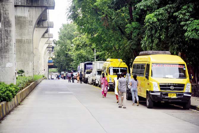 Parel: Heavy vehicles parked on Dr SS Rao Road in Parel are eating into the limited road space below the Monorail