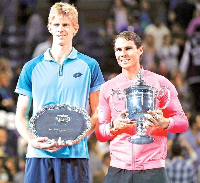 Rafael Nadal (right) and Kevin Anderson with their trophies in New York on Sunday. Pic/AFP, Getty Images 