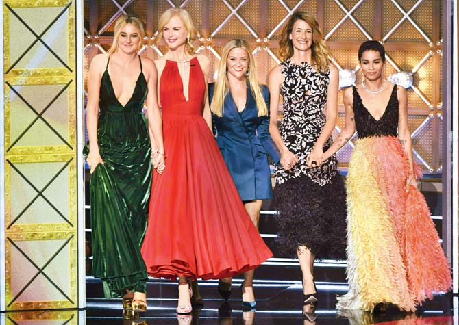 Reese Witherspoon (centre) walks onstage with fellow cast members of Big Little Lies, Shailene Woodley, Nicole Kidman, Laura Dern, and Zoe Kravitz, during the 69th Emmy Awards in Los Angeles on September 17. Pic/Getty Images