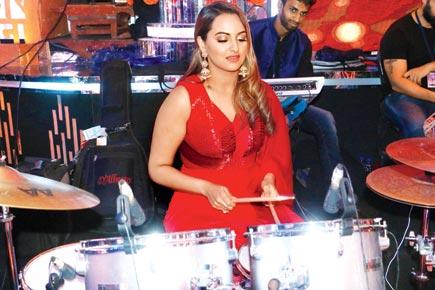 What fun! Sonakshi Sinha plays drums during power cut