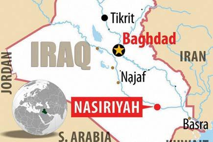 Twin IS-claimed suicide attacks that killed 52 in Iraq