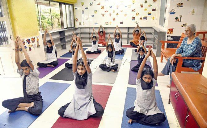 A morning yoga session at Bal Anand, the play-and-learn school founded by Devi Mangaldas’ (sitting extreme right) mother over 60 years ago, influenced by J Krishnamurti