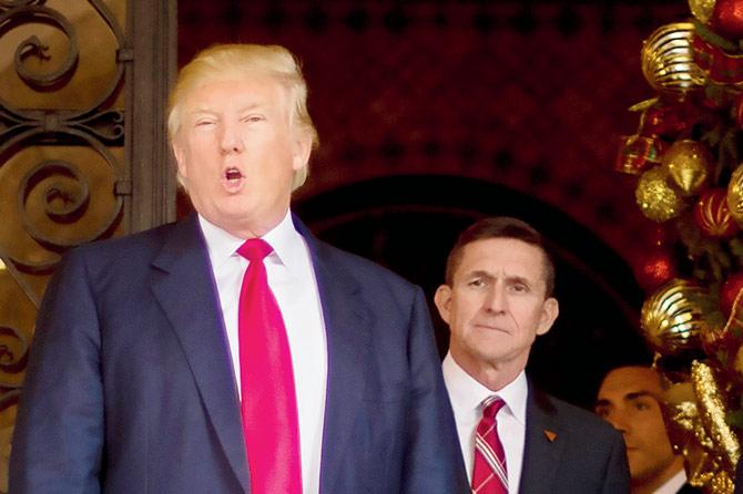 Michael Flynn (right) is a central figure in a federal probe into alleged collusion between the Trump presidential campaign and Russia. Pic/AFP