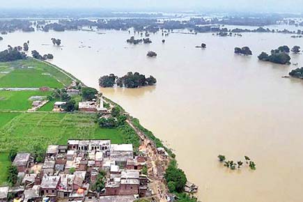 Toll in UP floods rises to 104