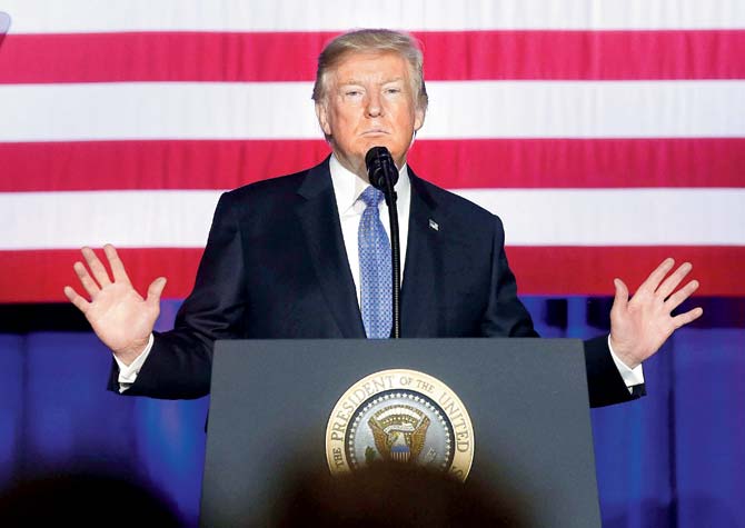 US President Donald Trump addresses supporters as he speaks at the Indiana State Fairgrounds & Event Center on Thursday. Pic/AFP