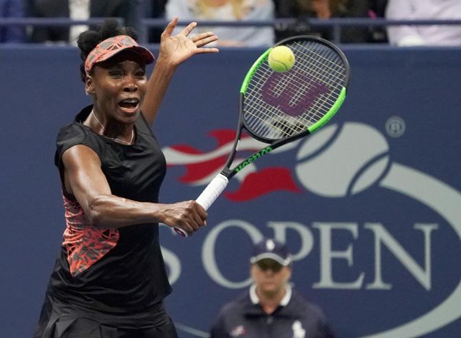 Venus Williams of the US hits a return to Sloane Stephens of the US during their 2017 US Open Women