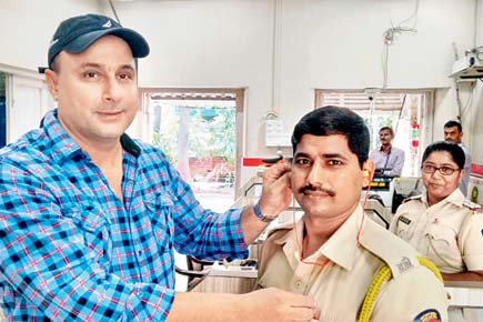 Mumbaikars donate ear plugs to cops on duty for Ganpati Visarjan