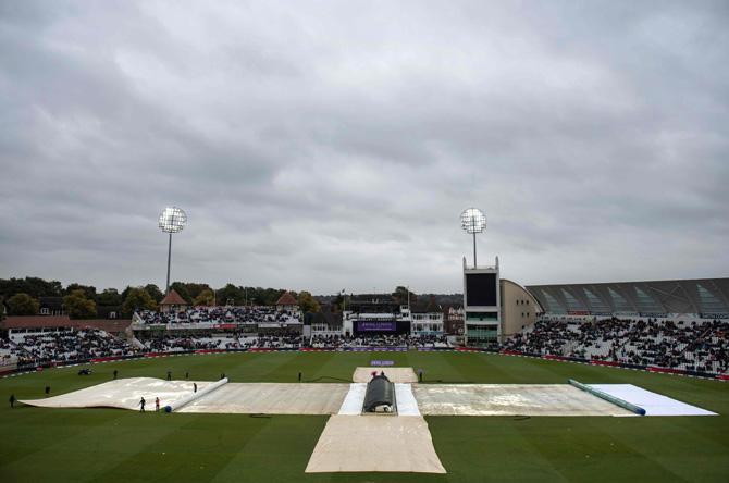 Groundstaff cover the wicket as rain delays play during the second One-Day International (ODI) cricket match between England and the West Indies held at Trent Bridge, Nottingham on September 21, 2017. Pic/AFP