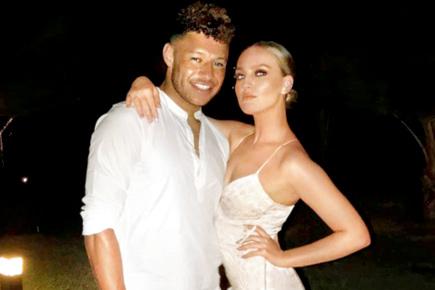 Perrie Edwards rubbishes reports of strain with footballer beau Alex Oxlade-Cham