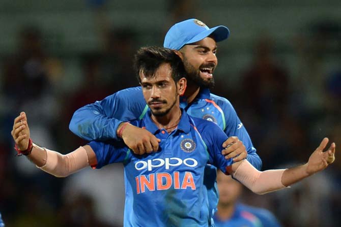 Yuzvendra Chahal celebrates a wicket along with skipper 