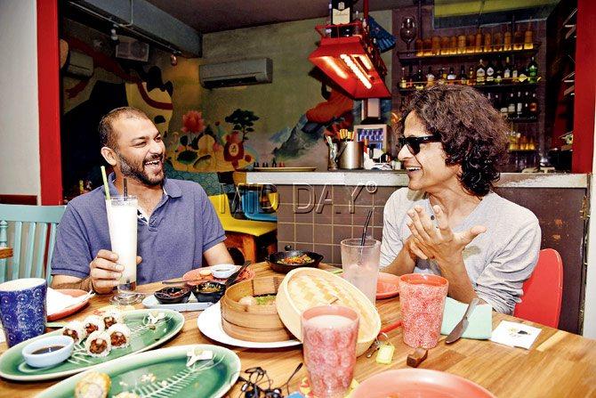 Sidd Coutto (left) and Arijit Datta share a laugh at The Fatty Bao in Bandra. Pics/Pradeep Dhivar