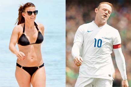 'Cheat' Wayne Rooney plans to woo wife Coleen with romantic getaway