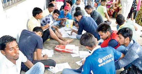 One of the viral pics show pupils sitting in the veranda with books while answering an exam paper 