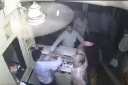 Watch Video: Cop assaults Thane bar staffers over food bill
