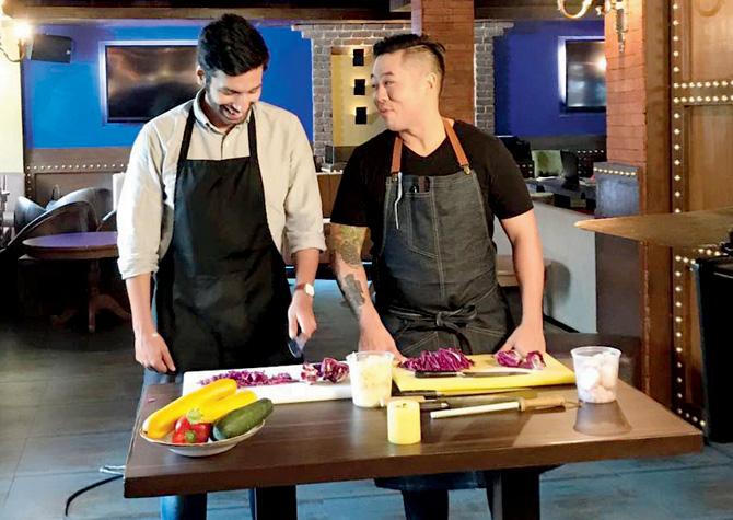 Chef Kelvin Cheung teaches comedian Kanan Gill how to chop vegetables. Pics courtesy/Aniket Dasgupta for OML