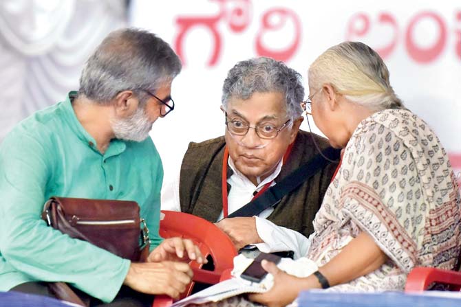 Theater personality Girish Karnad with social activist Medha Patkar at a public rally by the Forum Against the Assassination of Gauri Lankesh at Central College Ground on September 12 in Bangalore. Karnad is one of 21 intellectuals in Karnataka who has been provided security.