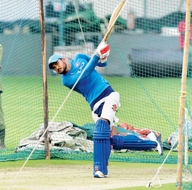 India batsman Manish Pandey goes for a big one during a practice session ahead of tomorrow’s fourth one-day international against Australia at the M Chinnaswamy Stadium in Bangalore yesterday. The Karnataka player will play his first ODI at home on Thursday. Pic/AFP