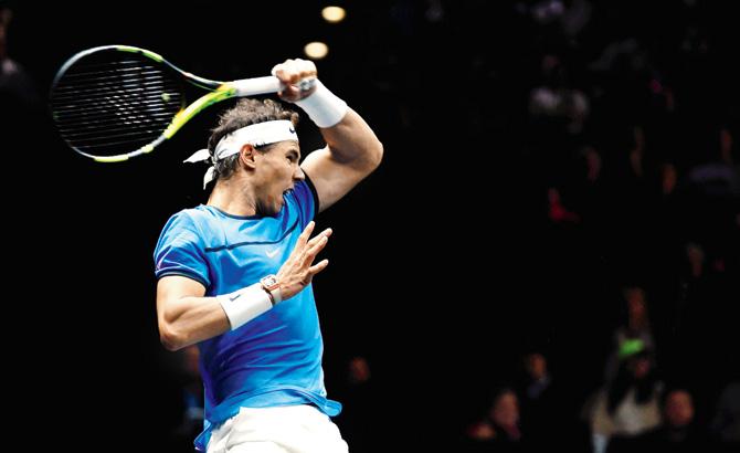 Rafael Nadal returns to Jack Sock on Saturday. Pic/AFP
