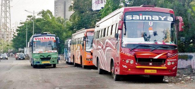 Private buses parked illegally on the Western Urban Road. Pic/Nimesh Dave