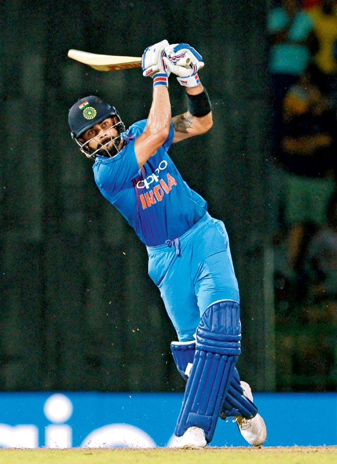 India captain Virat Kohli in full cry en route his 82 against Sri Lanka during the T20I match at R Premadasa Stadium in Colombo yesterday. India won by seven wickets. Pic/AFP