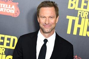 Aaron Eckhart and Courtney Eaton to star in Live!