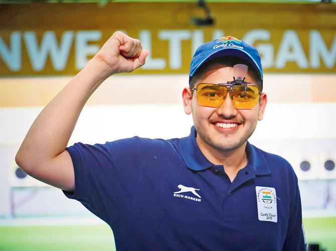 India teenager Anish Bhanwala is all smiles after the 25m rapid fire pistol final at the Gold Coast Commonwealth Games yesterday. Pic/AFP