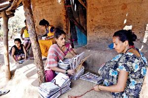 Plastic ban: Aarey tribals learn to make bag out of newspapers