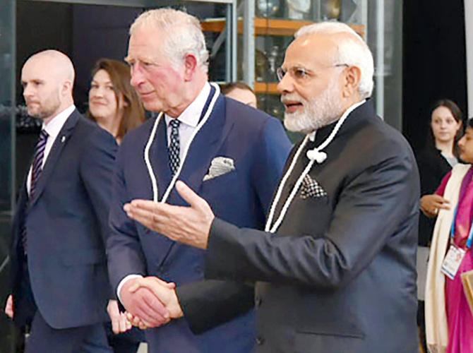 Modi and Prince Charles. The Indian PM is in London to take part in the Commonwealth Heads of Government meeting starting today. Pic/PTI
